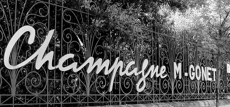 Gates with Champagne written on them.