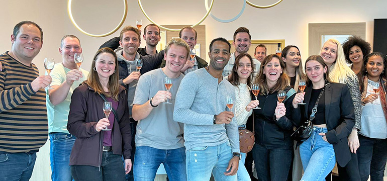 Group toast at a Champagne tasting.